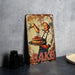 a metal sign that says bake on it