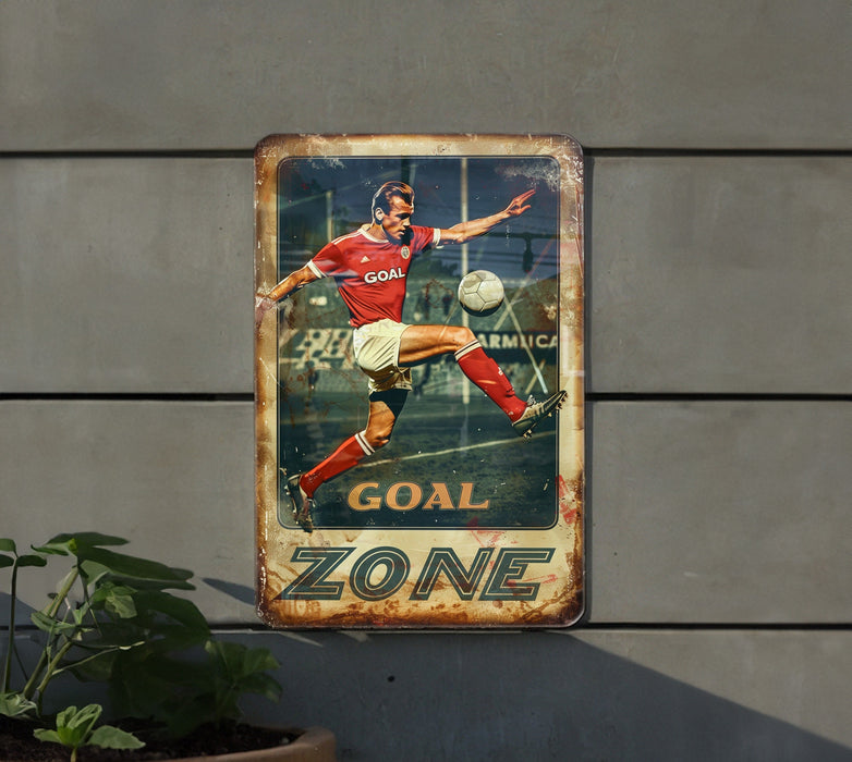a metal sign with a soccer player kicking a soccer ball
