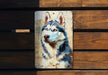 a painting of a husky dog on a wooden wall