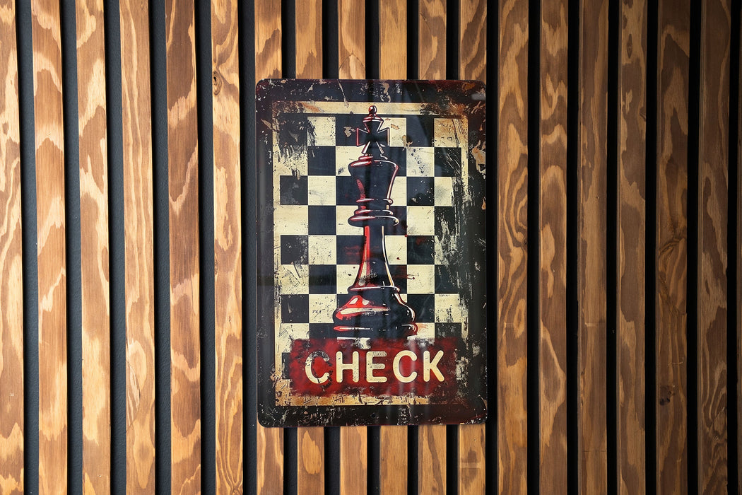a metal sign with a chess piece on it