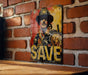 a picture of a man in a hat on a brick wall