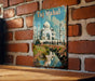 a picture of taj mahlal on a brick wall