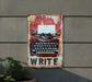 a rusty sign with an old typewriter on it