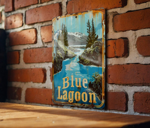 a blue lagoon sign on a brick wall