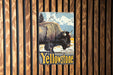 a painting of a bison on a wooden wall