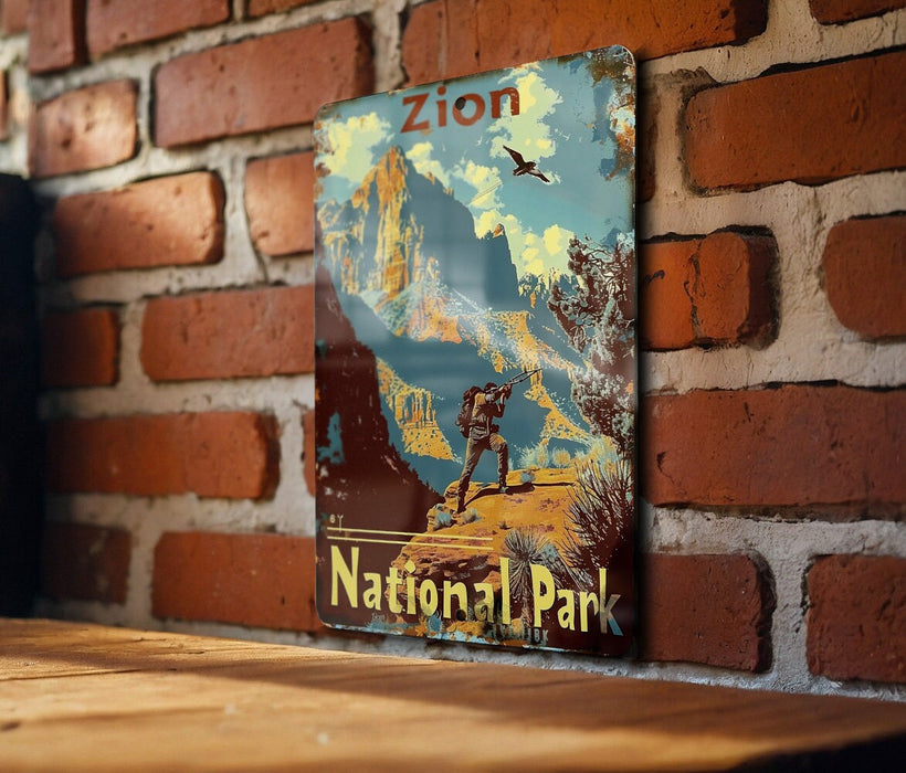 a picture of a national park hanging on a brick wall
