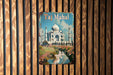 a picture of taj mahl on a wooden wall
