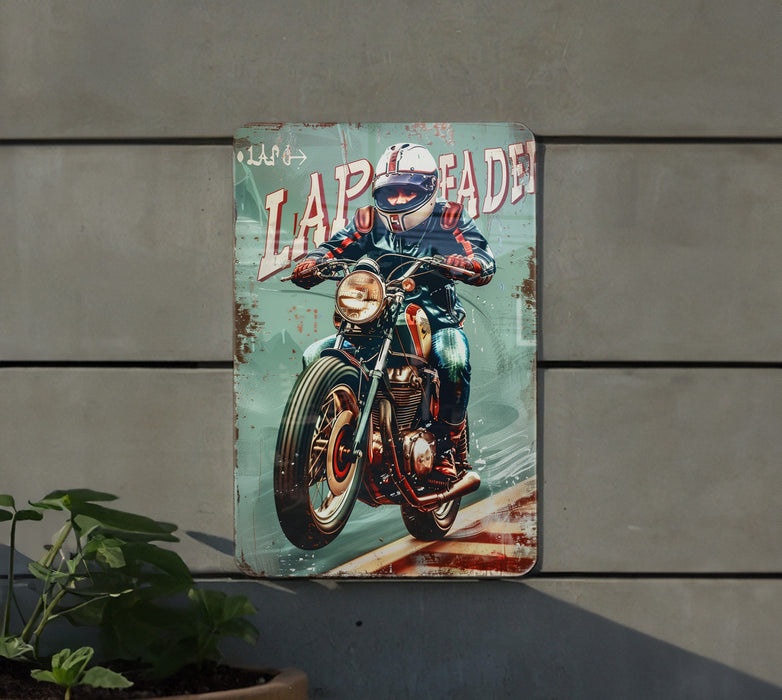 a painting of a motorcyclist on a metal sign