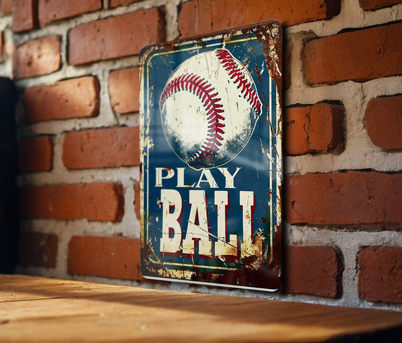 a sign on a brick wall that says play ball