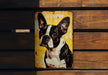 a picture of a black and white dog on a yellow background