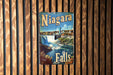 a picture of niagara falls on a wooden wall