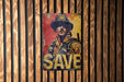 a picture of a man in a cowboy hat on a wooden wall