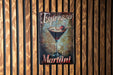 a picture of a martini sign hanging on a wall