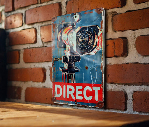a picture of a camera hanging on a brick wall
