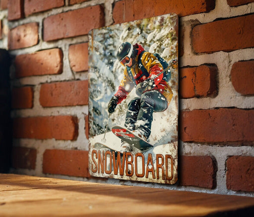 a picture of a snowboarder on a brick wall