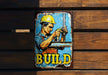 a sign on a wooden wall that says build