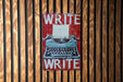 a sign that says write and a typewriter on it