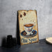 a painting of a cup of coffee on a table