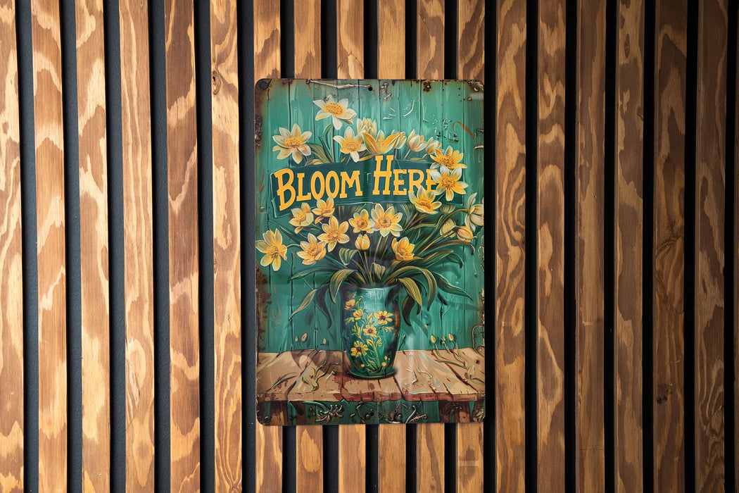 a sign on a wooden wall that says bloom here