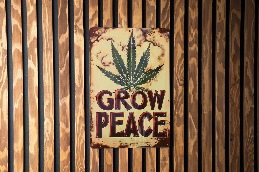 a sign on a wall that says grow peace