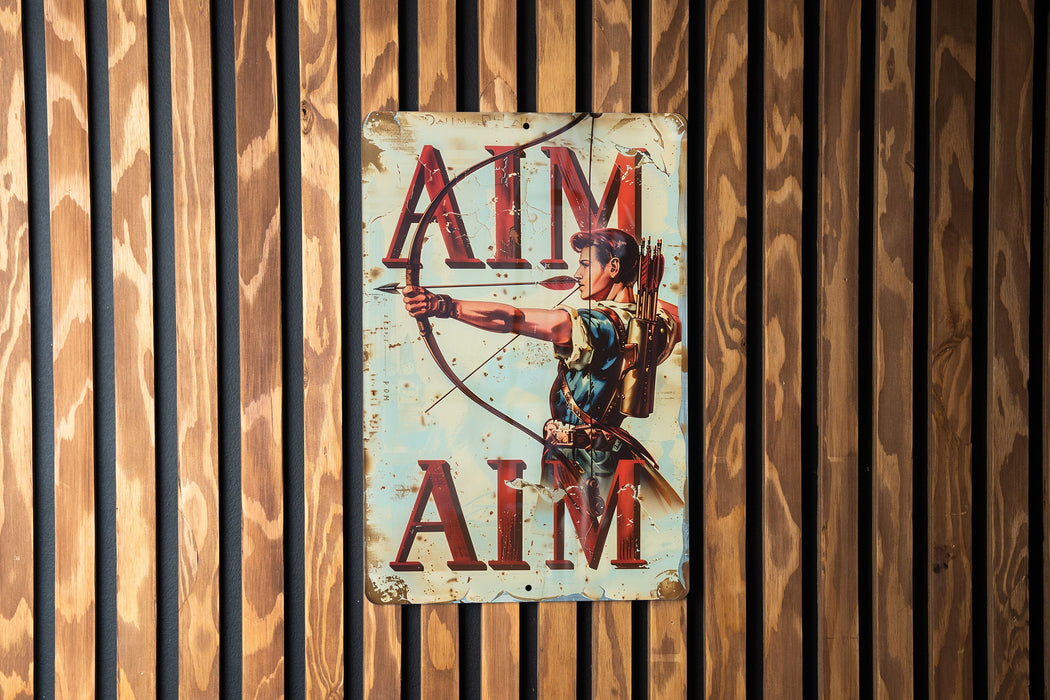 a sign on a wall that says aim aim