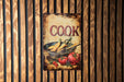 a sign on a wooden wall that says cook