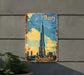 a metal sign with a picture of burj on it