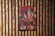 a sign that says leaf it be on a wooden wall