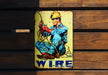a sign on a wooden wall that says wire