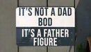 a white and black sign on a wooden fence