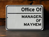a sign that says office of manager of mayhem