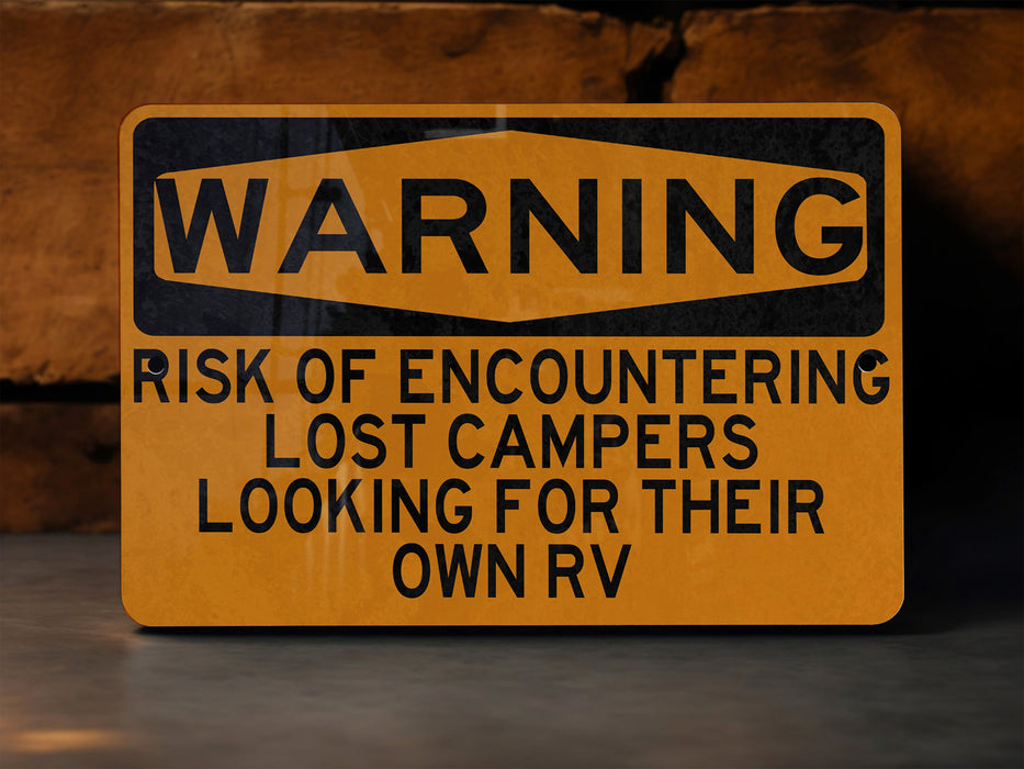 a warning sign on the ground in front of a wall