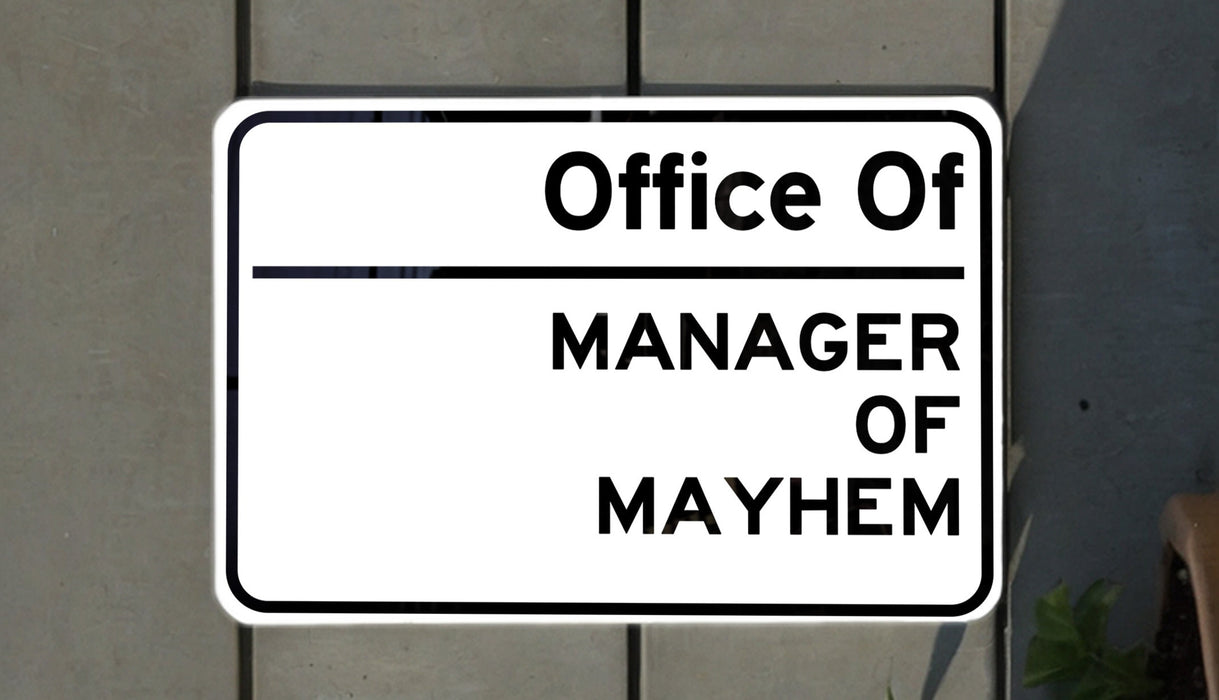 a white sign with black lettering on it