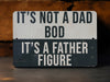 a sign that says it's not a dad bod it's a