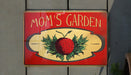 a red sign with a picture of a strawberry on it