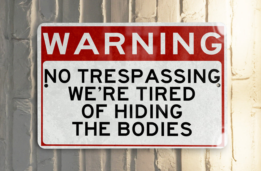 a red and white sign that says the bodies of hiding meke liked no less