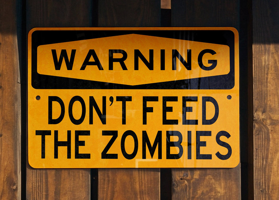 a yellow sign that says the zombies don't bleed