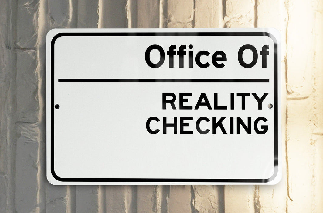 a close up of a street sign on a pole