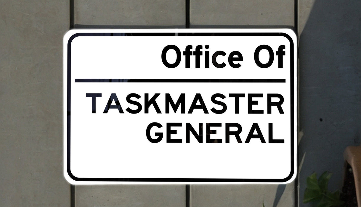 a white and black sign on a brick wall