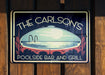 a sign on the side of a wooden fence