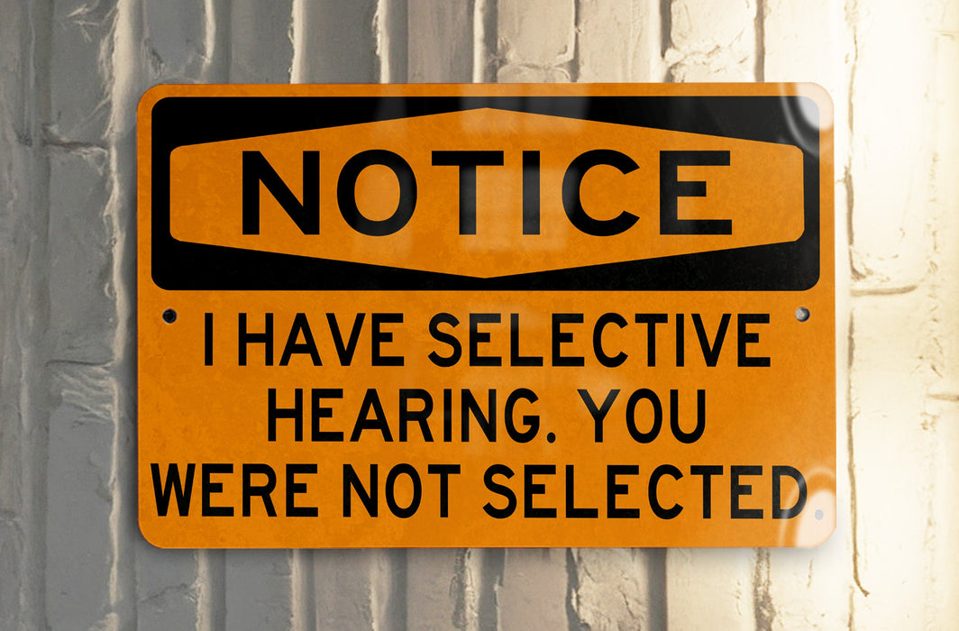 a close up of a street sign on a pole