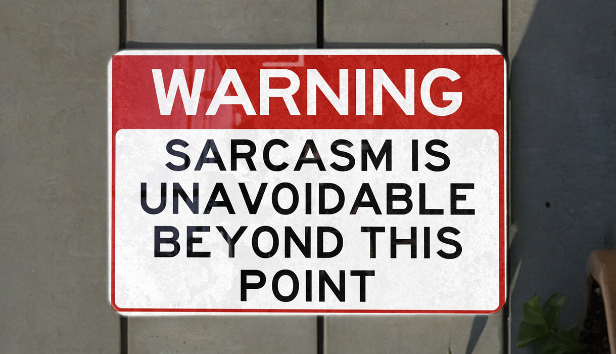 a red and white sign on a wall