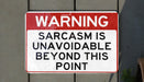 a red and white sign on a wall