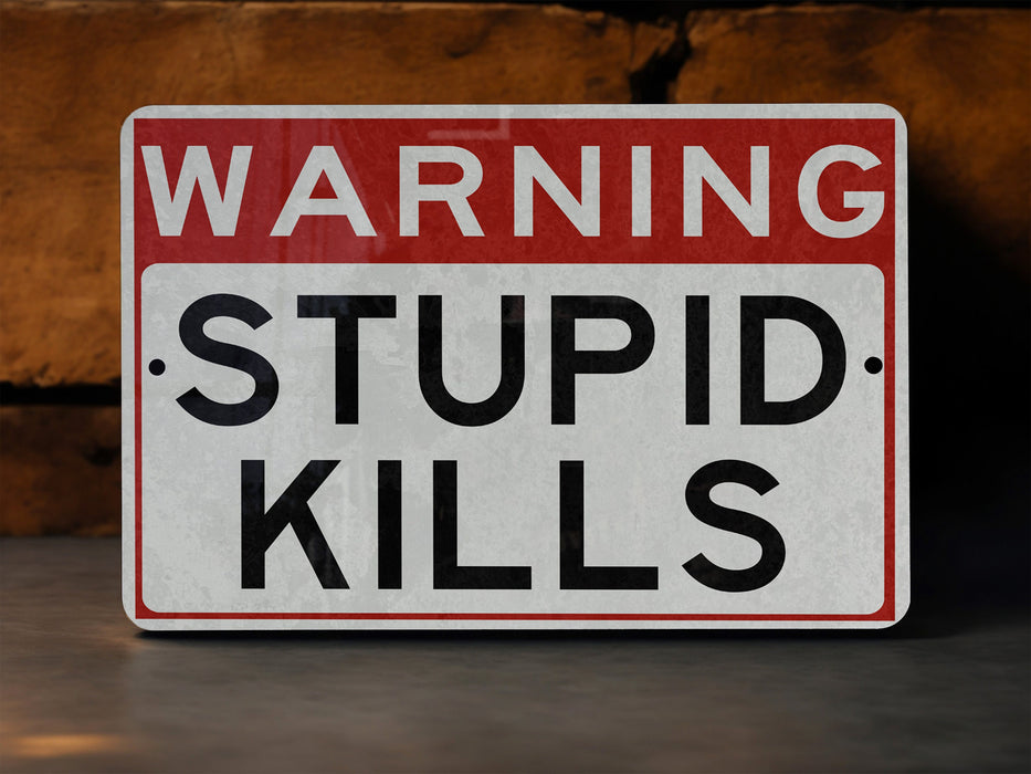 a red and white sign warning of stupid kills