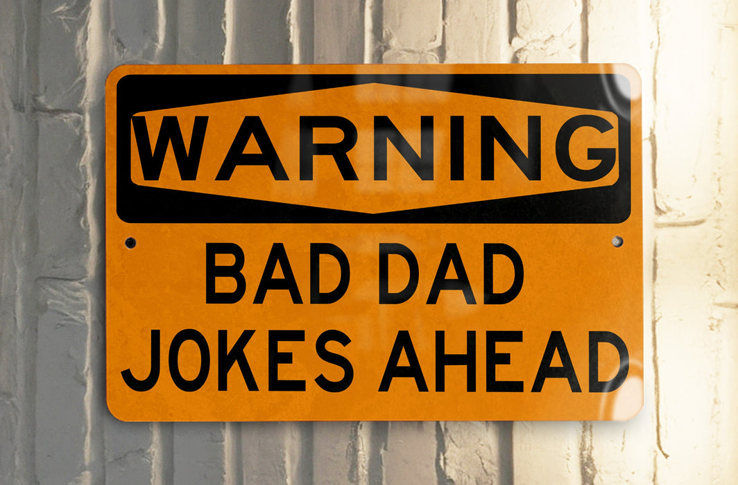 a yellow and black sign on a metal pole