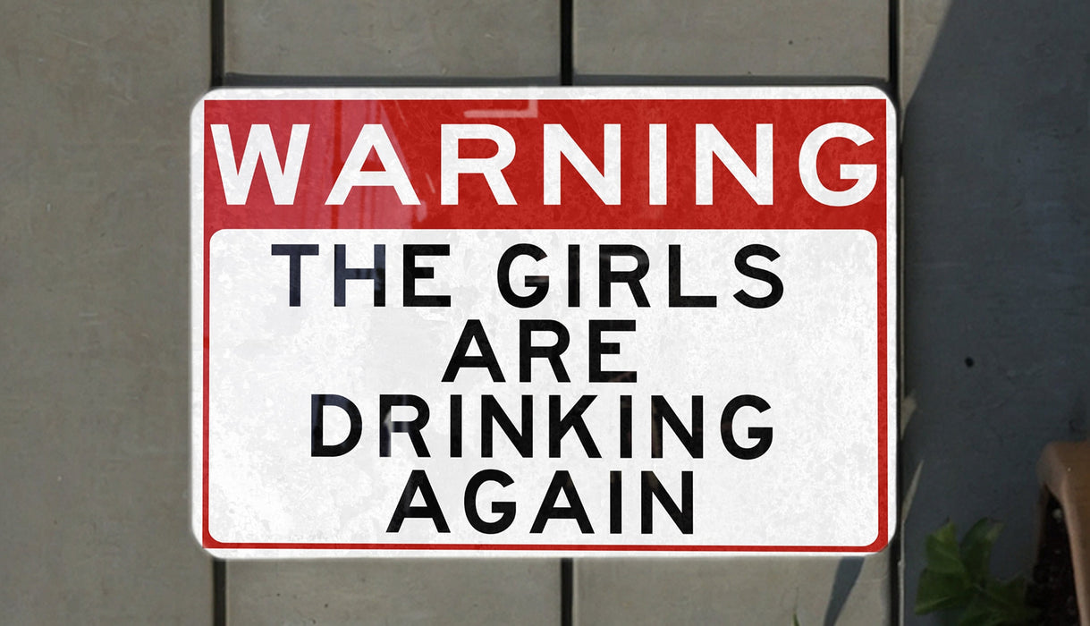 a red and white sign on a wall