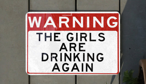 a red and white sign on a wall