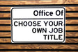 a close up of a street sign on a wooden surface
