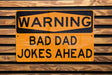 a close up of a street sign on a wooden surface