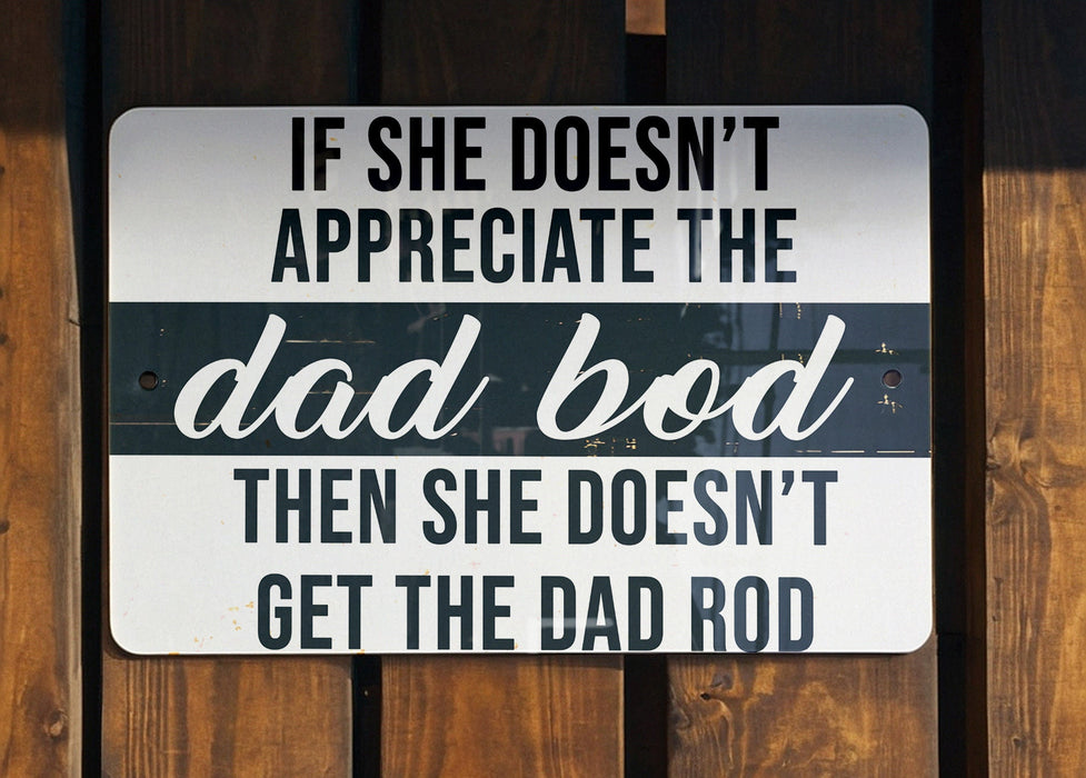 a sign on a wooden fence that says pop pop